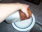 Remove the bread slowly from the container after cooling for an hour